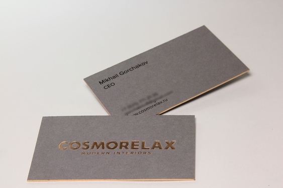 Двухсторонняя визитка для компании Cosmorelax с золотым тиснением 